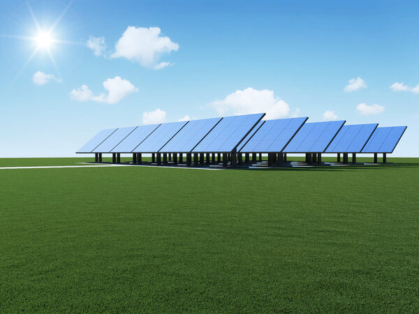 现代在与太阳和云美丽的绿色草地上的太阳能电池板。可替代能源的概念 图片素材