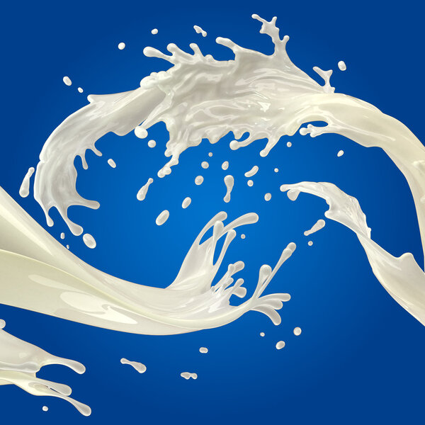 蓝色背景上的白色牛奶溅 图片素材