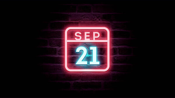 9月21日日历，背景上有霓虹灯蓝色和红色霓虹灯    图片素材