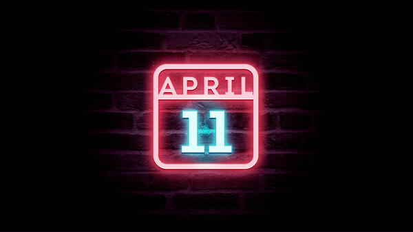 4月11日日历，底座上有霓虹灯蓝色和红色霓虹灯   图片素材