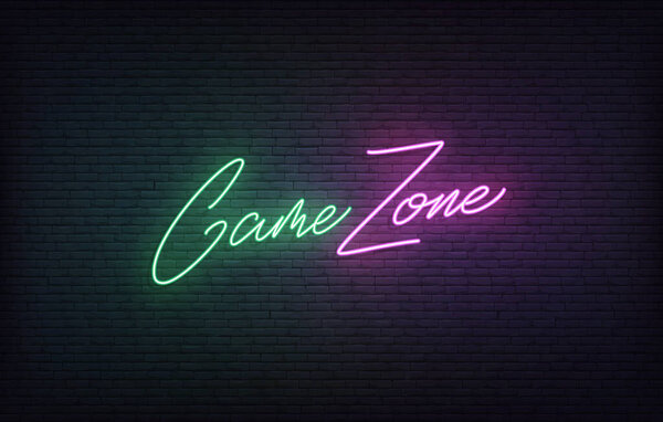 游戏区霓虹灯标志。Glowing Gaming字母的概念 图片素材