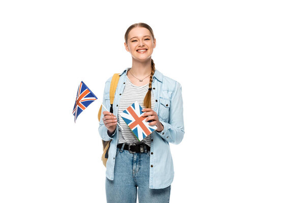 快乐漂亮的学生，背着书包，白色上挂着英国国旗 图片素材
