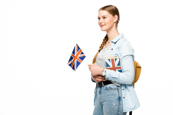 笑容可亲的学生，背着书包，挂着白色的英国国旗 图片素材