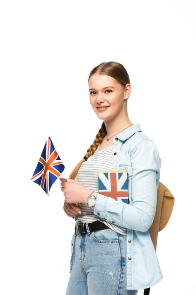笑容可亲的学生，背着书包，挂着白色的英国国旗 图片素材