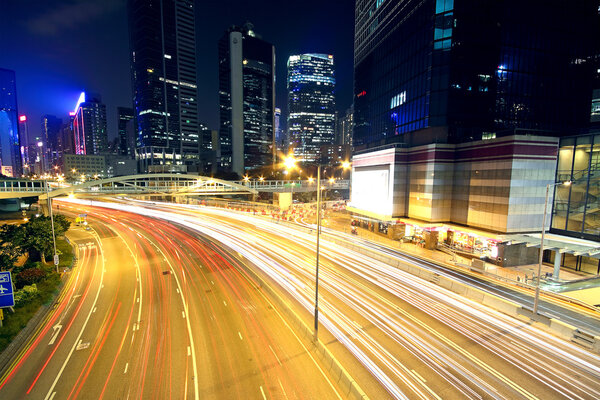五彩城晚上与汽车运动在香港 k 模糊的光 图片素材